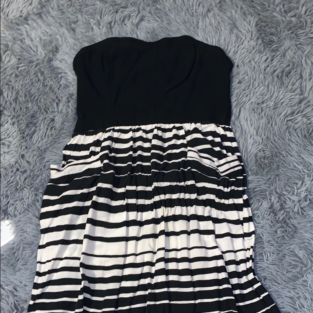 Black and white striped strapless dress.